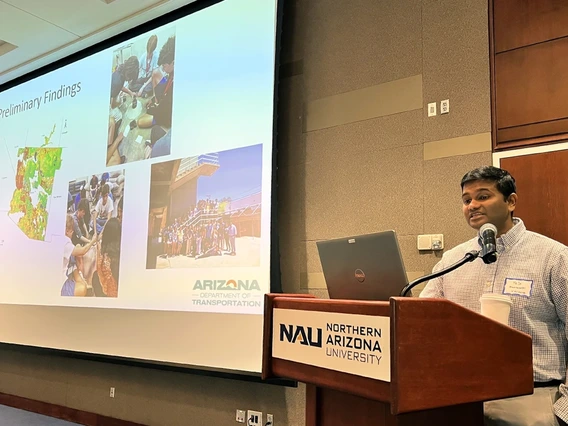 At the 2025 Arizona Transportation Institute Summit, U of A assistant professor Tejo Bheemasetti shows data associated with the number of battery-laden EVs on the road.