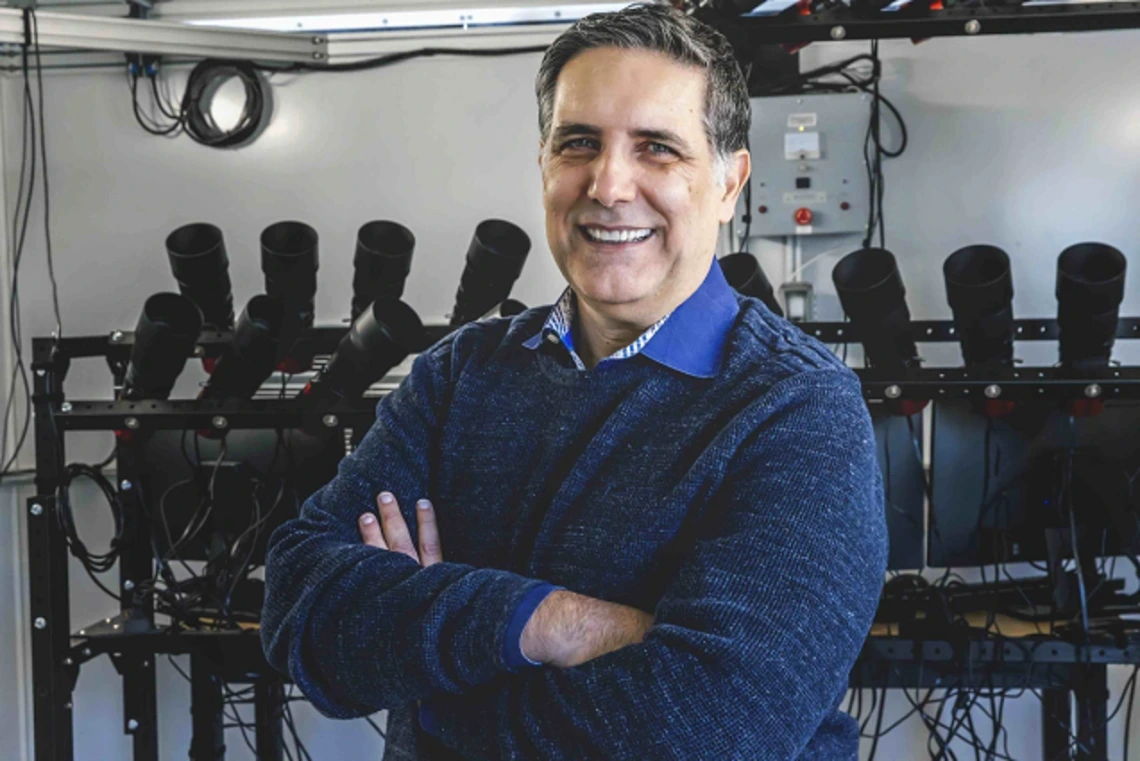 Roberto Furfaro poses for a photo in a laboratory
