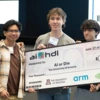 The competition's winning team, AI or Die, accepts a $5,000 check from Nvidia.